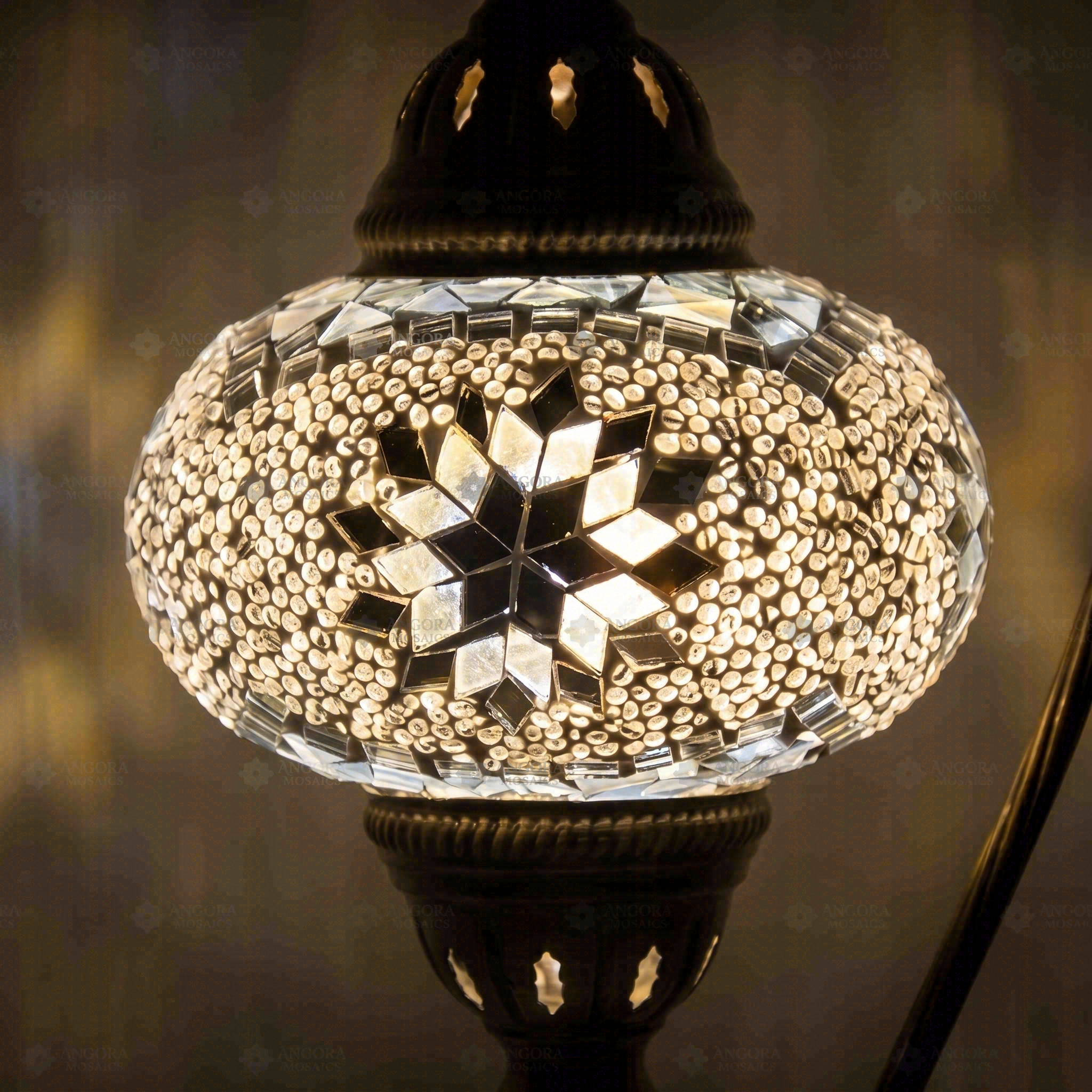 Lit close-up of mosaic glass globe — White table lamp glowing (ENV DVN3022)