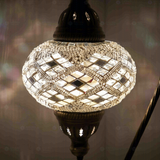 Lit close-up of mosaic glass globe — White table lamp glowing (ENV DVN3023)