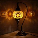 Amber Turkish mosaic table lamp illuminated, showing colorful light projection (ENV DVN3026)