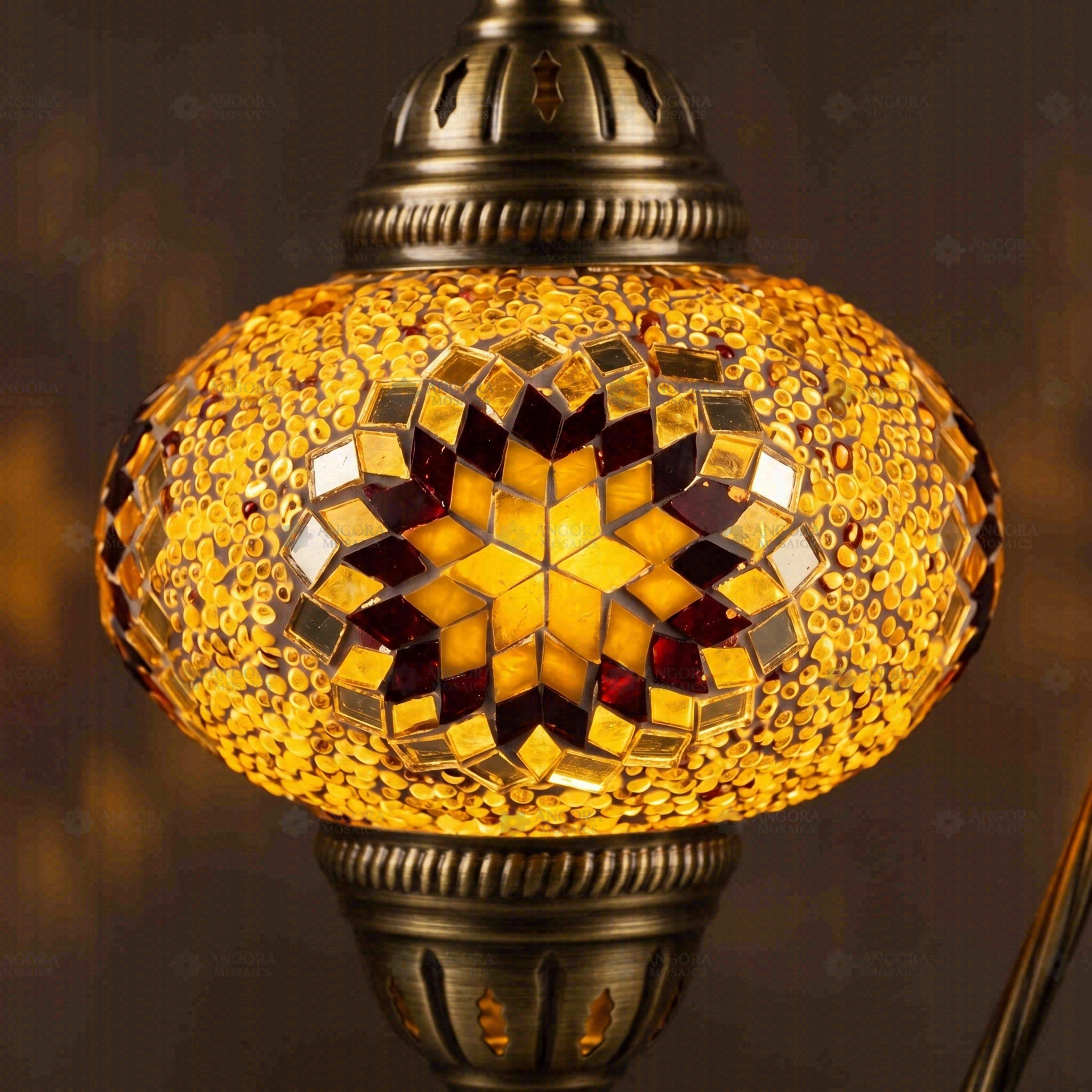 Lit close-up of mosaic glass globe — Amber table lamp glowing (ENV DVN3026)