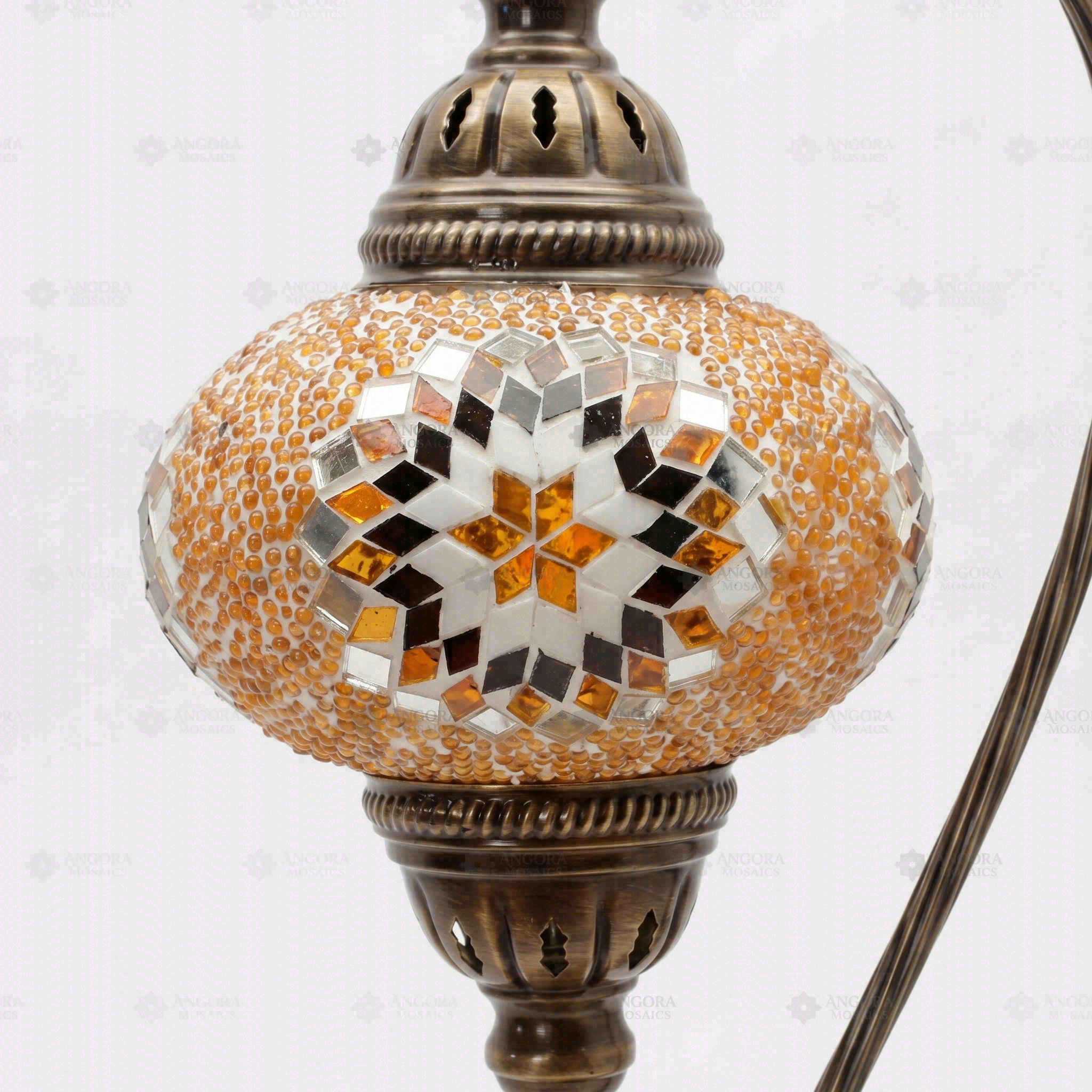 Close-up of Amber warm amber mosaic glass globe pattern — table lamp (ENV DVN3026)