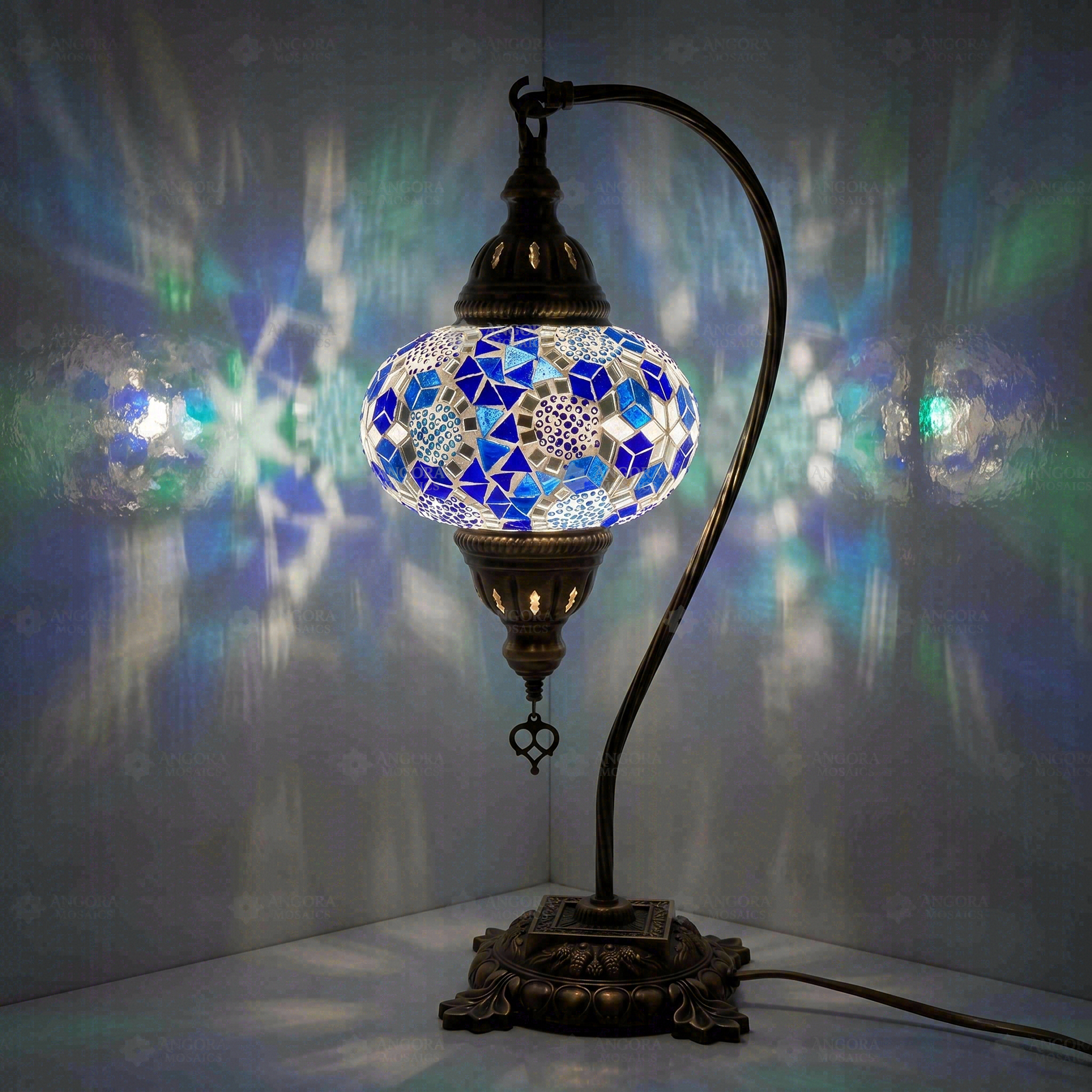Blue Turkish mosaic table lamp illuminated, showing colorful light projection (ENV DVN3028)