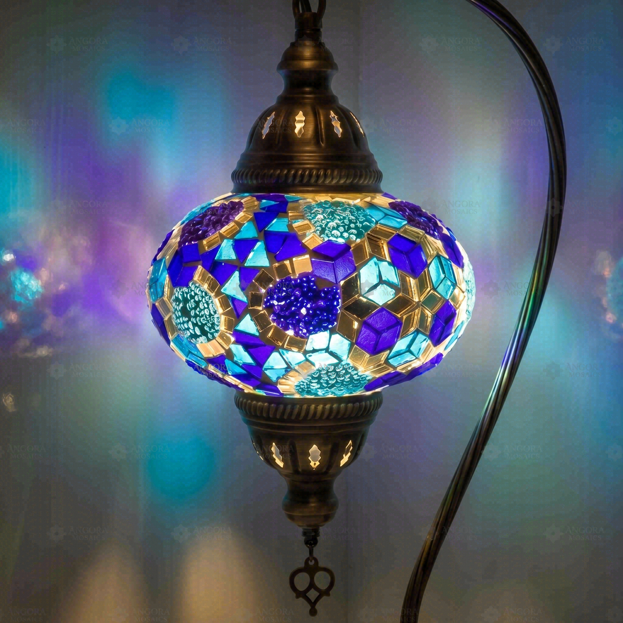 Lit close-up of mosaic glass globe — Blue table lamp glowing (ENV DVN3032)