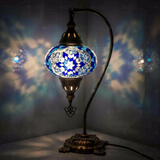 Blue Turkish mosaic table lamp illuminated, showing colorful light projection (ENV DVN3039)
