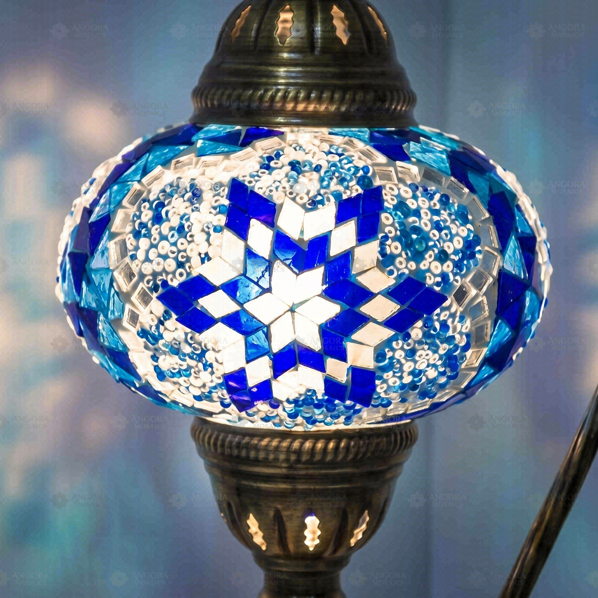 Lit close-up of mosaic glass globe — Blue table lamp glowing (ENV DVN3039)