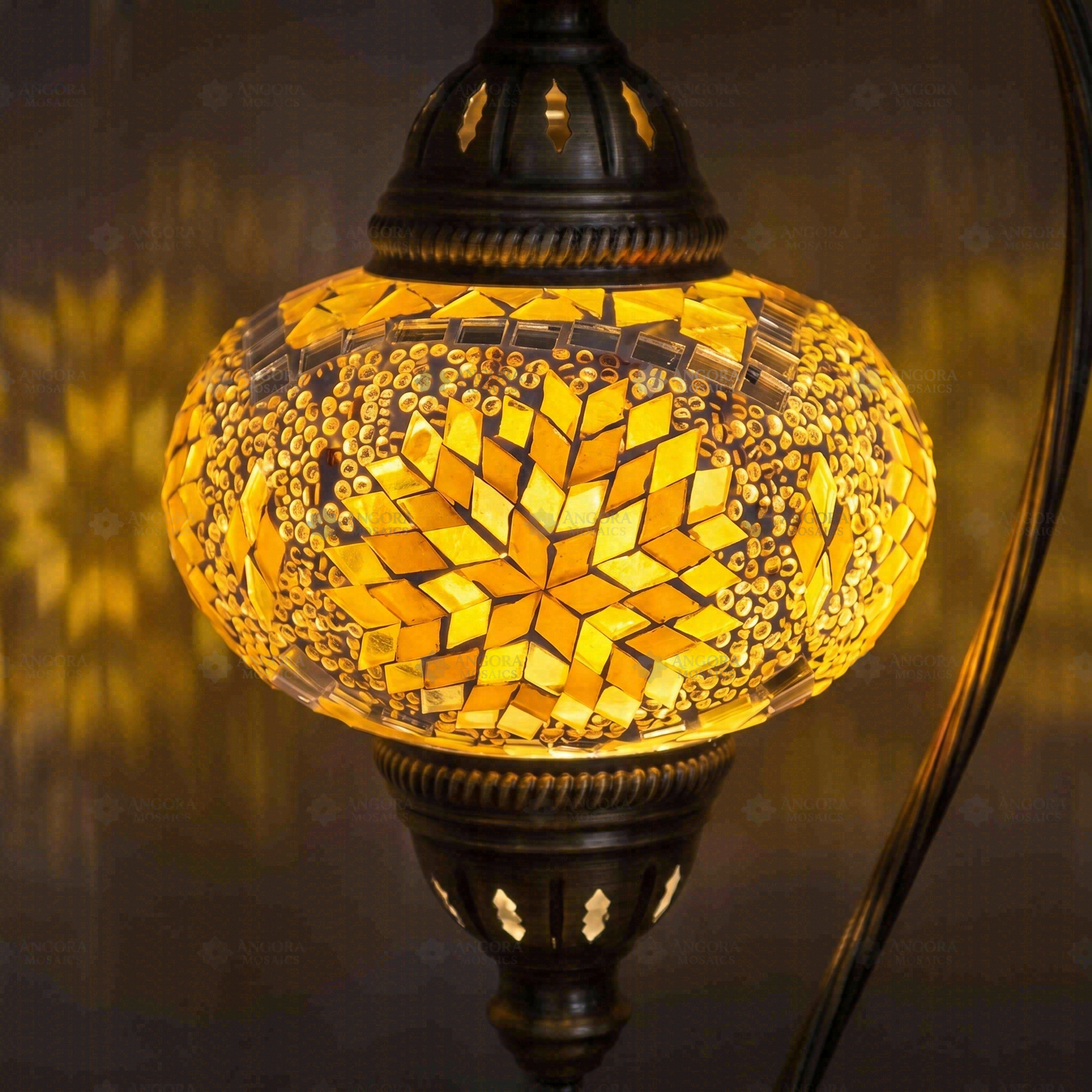 Lit close-up of mosaic glass globe — Amber table lamp glowing (ENV DVN3043)