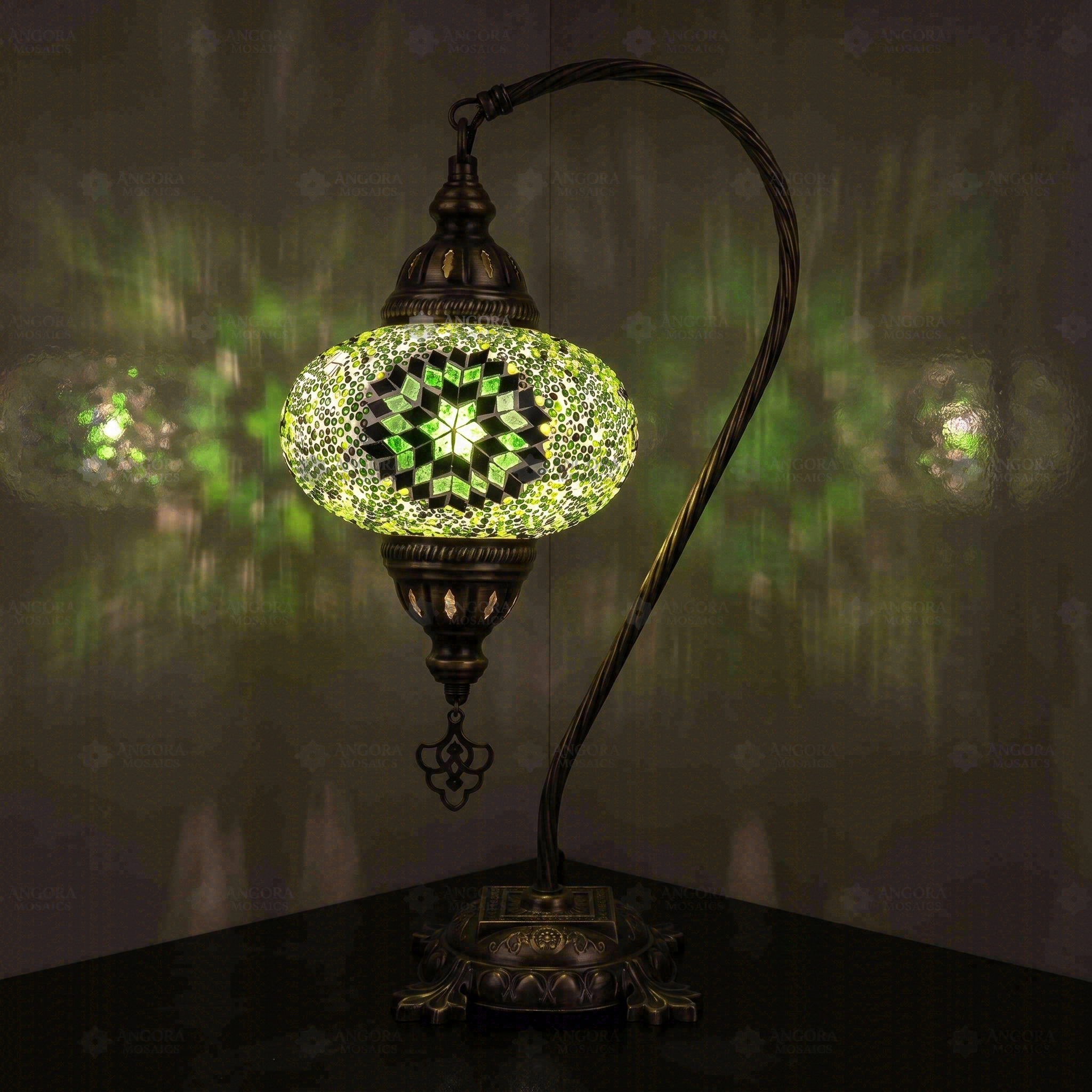 Green Turkish mosaic table lamp illuminated, showing colorful light projection (ENV DVN3048)