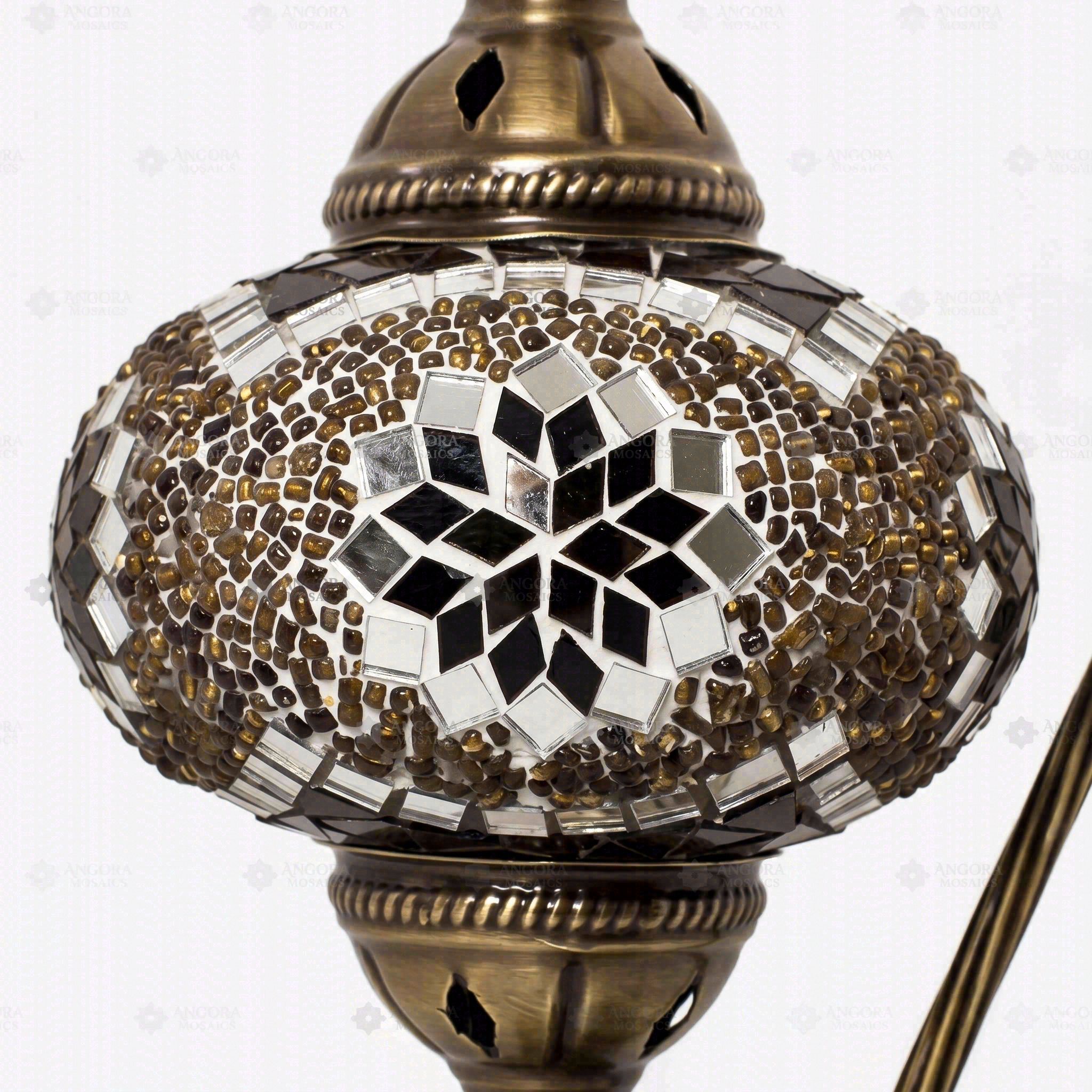 Close-up of Amber warm amber mosaic glass globe pattern — table lamp (ENV DVN3049)