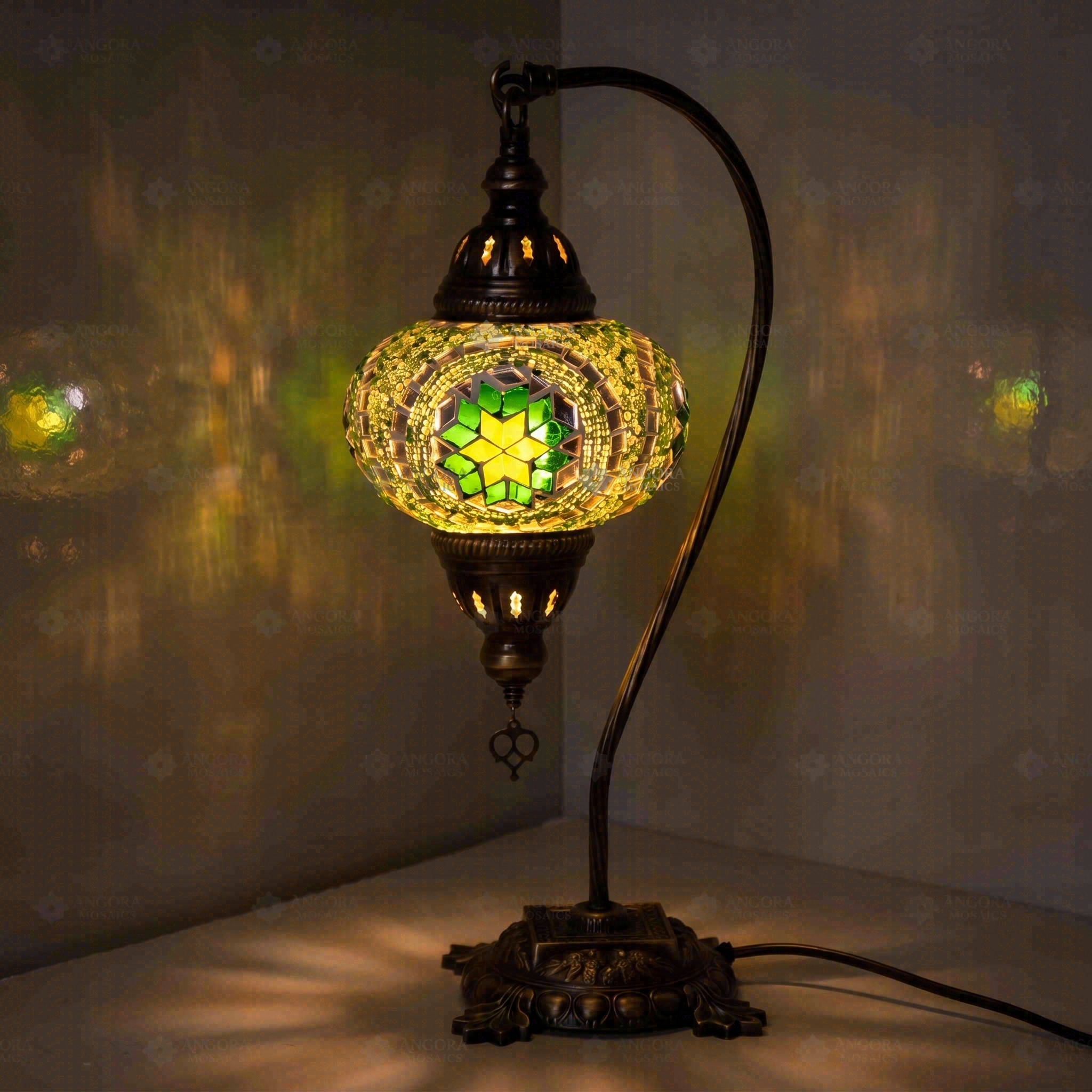 Green Turkish mosaic table lamp illuminated, showing colorful light projection (ENV DVN3050)