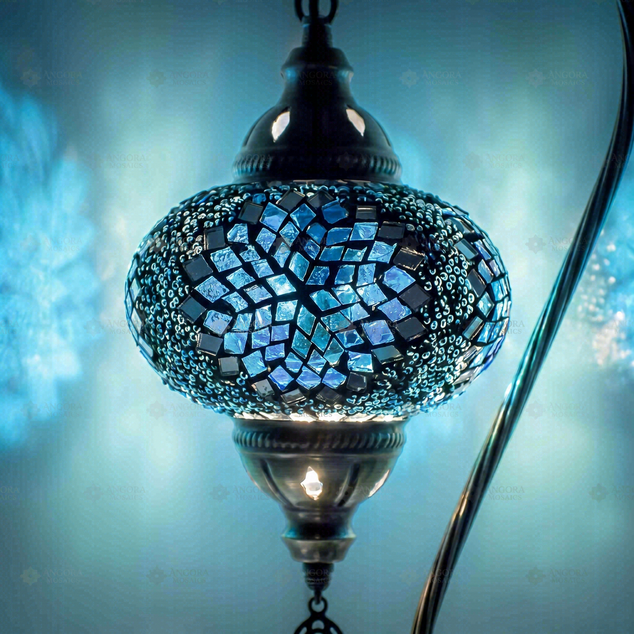 Lit close-up of mosaic glass globe — Blue table lamp glowing (ENV DVN3051)