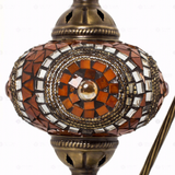 Close-up of Amber warm amber mosaic glass globe pattern — table lamp (ENV DVN3052)
