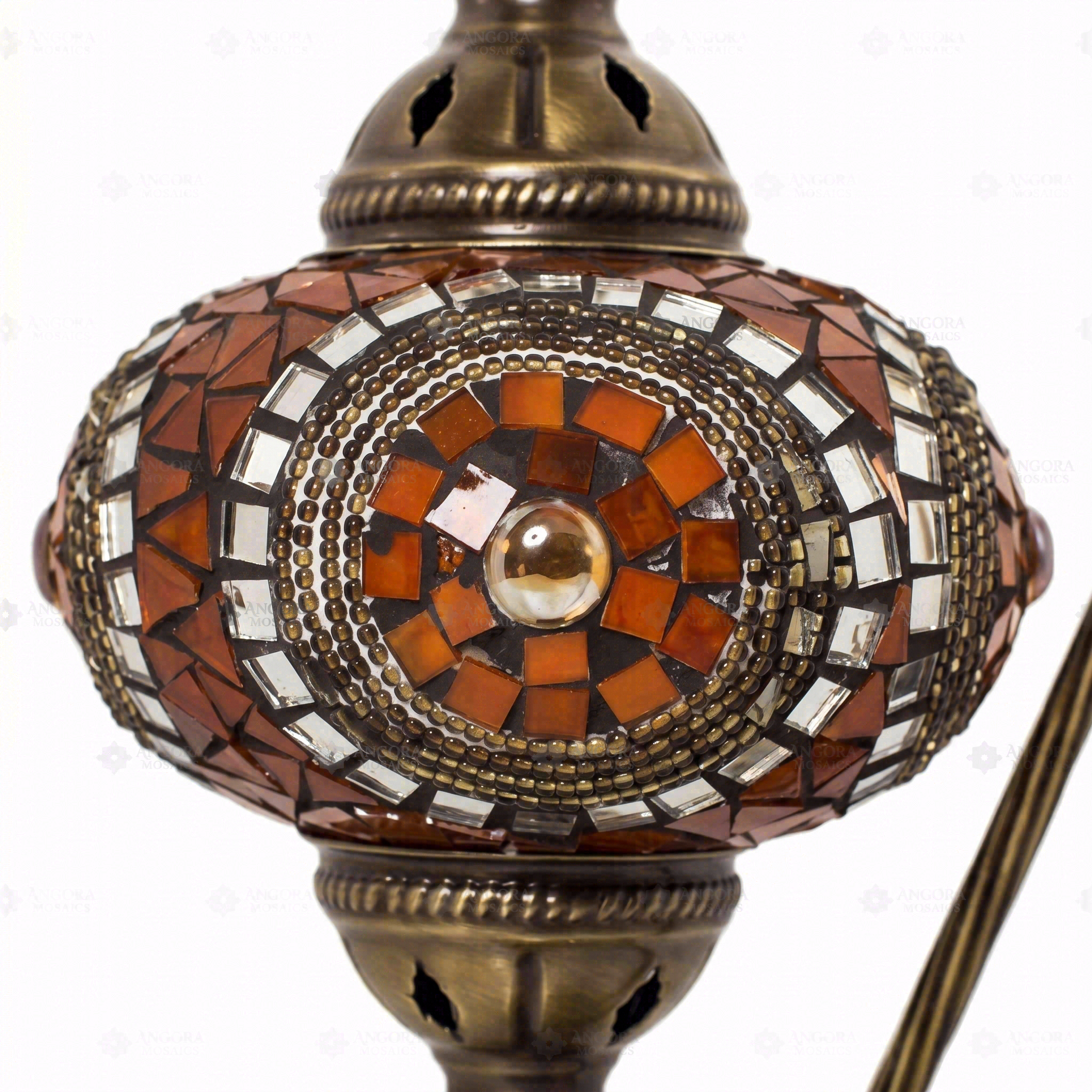 Close-up of Amber warm amber mosaic glass globe pattern — table lamp (ENV DVN3052)