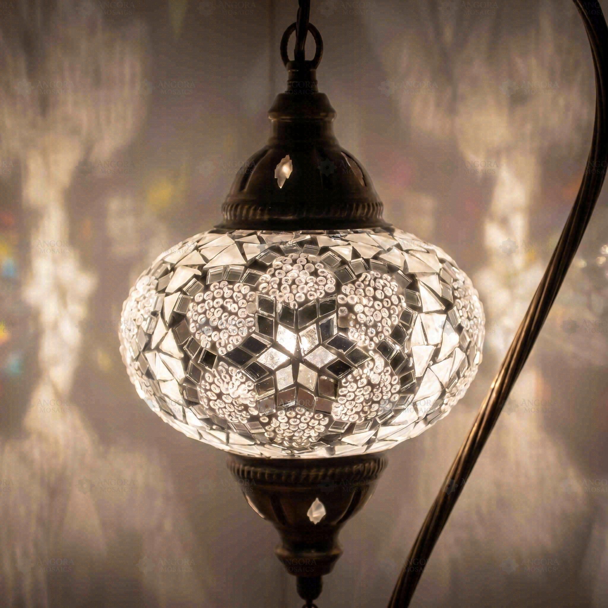 Lit close-up of mosaic glass globe — White table lamp glowing (ENV DVN3054)