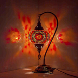Red Turkish mosaic table lamp illuminated, showing colorful light projection (ENV DVN3056)