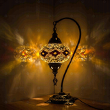 Amber Turkish mosaic table lamp illuminated, showing colorful light projection (ENV DVN3057)