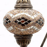 Close-up of Amber warm amber mosaic glass globe pattern — table lamp (ENV DVN3057)
