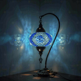 Blue Turkish mosaic table lamp illuminated, showing colorful light projection (ENV DVN3058)