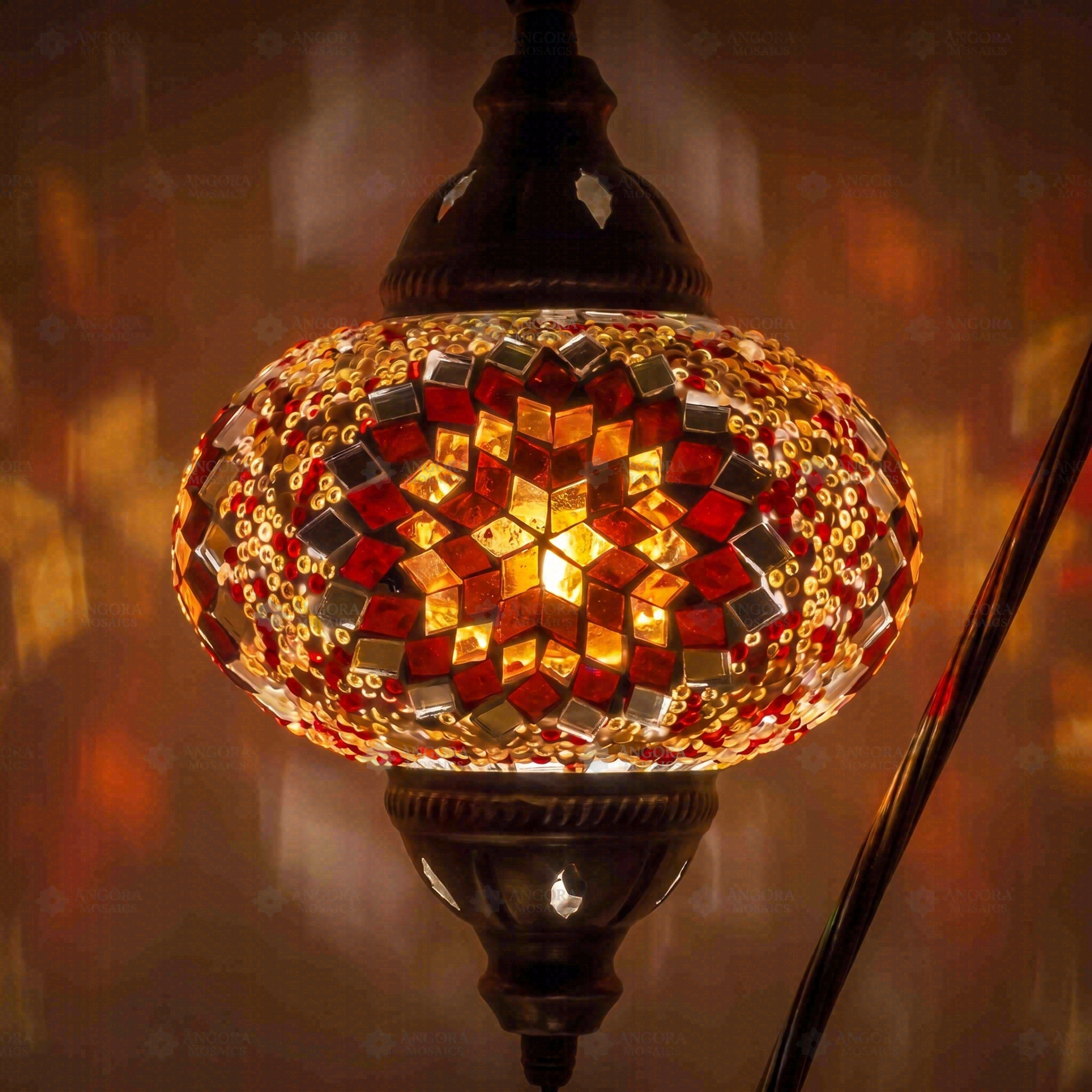 Lit close-up of mosaic glass globe — Amber table lamp glowing (ENV DVN3065)
