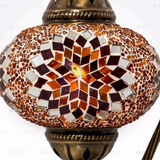Close-up of Amber warm amber mosaic glass globe pattern — table lamp (ENV DVN3065)