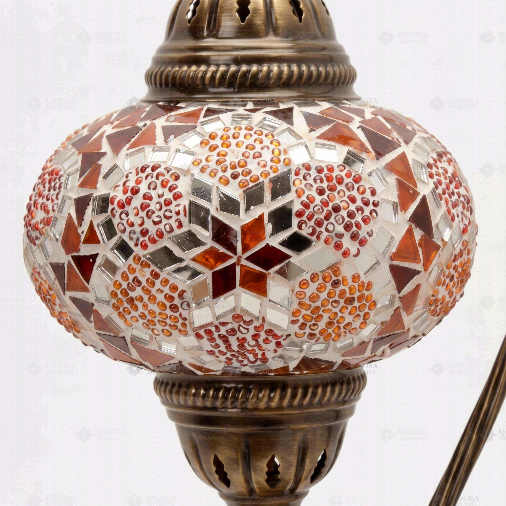 Close-up of Amber warm amber mosaic glass globe pattern — table lamp (ENV DVN3079)