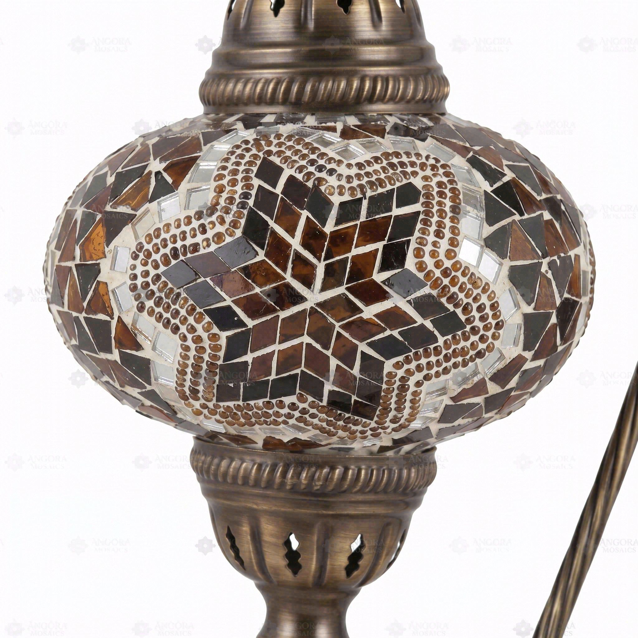 Close-up of Amber warm amber mosaic glass globe pattern — table lamp (ENV DVN3088)