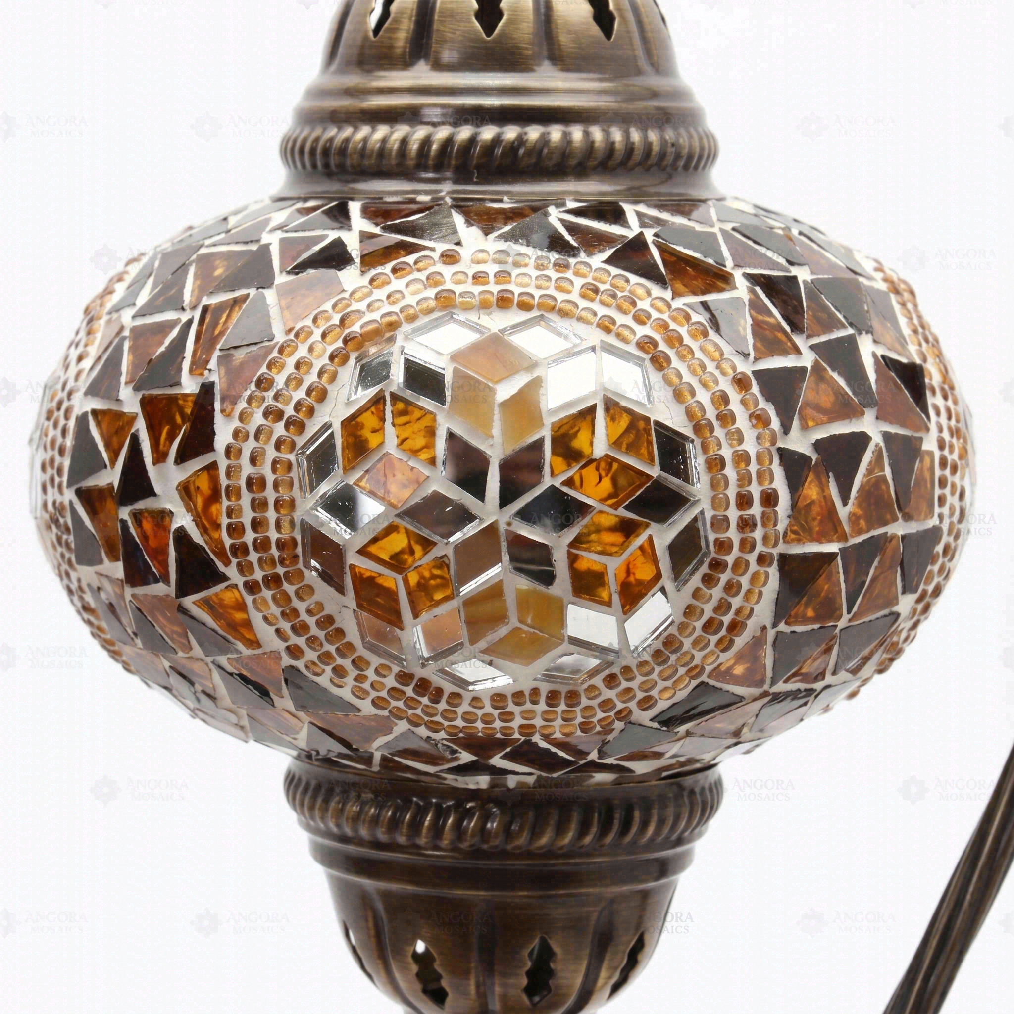 Close-up of Amber warm amber mosaic glass globe pattern — table lamp (ENV DVN3089)