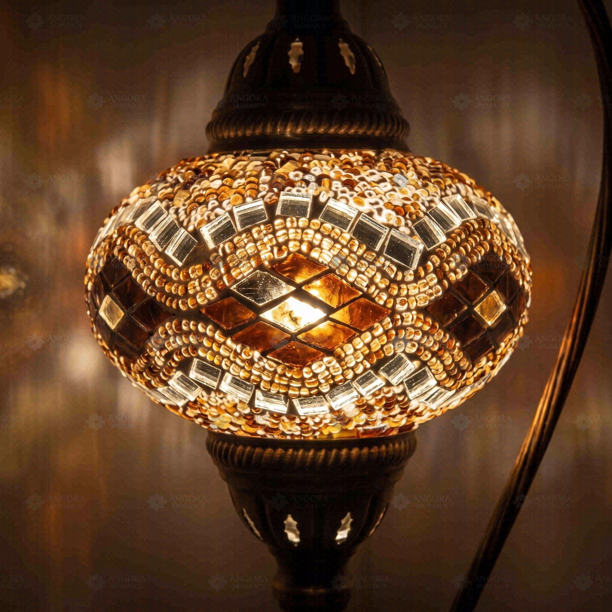 Lit close-up of mosaic glass globe — Amber table lamp glowing (ENV DVN3097)