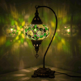 Green Turkish mosaic table lamp illuminated, showing colorful light projection (ENV DVN3100)