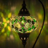 Lit close-up of mosaic glass globe — Green table lamp glowing (ENV DVN3100)
