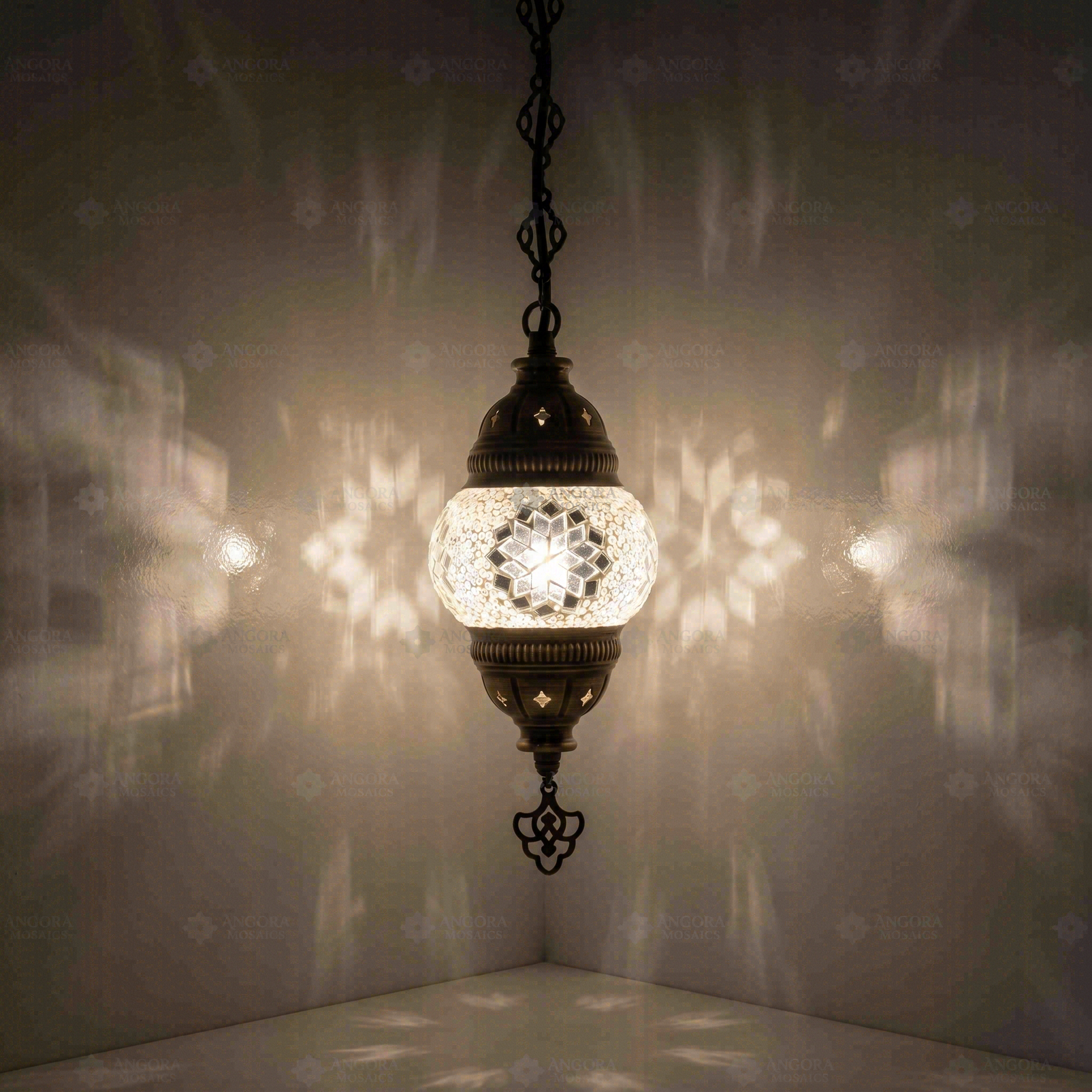 White Turkish mosaic pendant light illuminated, showing colorful light projection (ENV DYN1001)