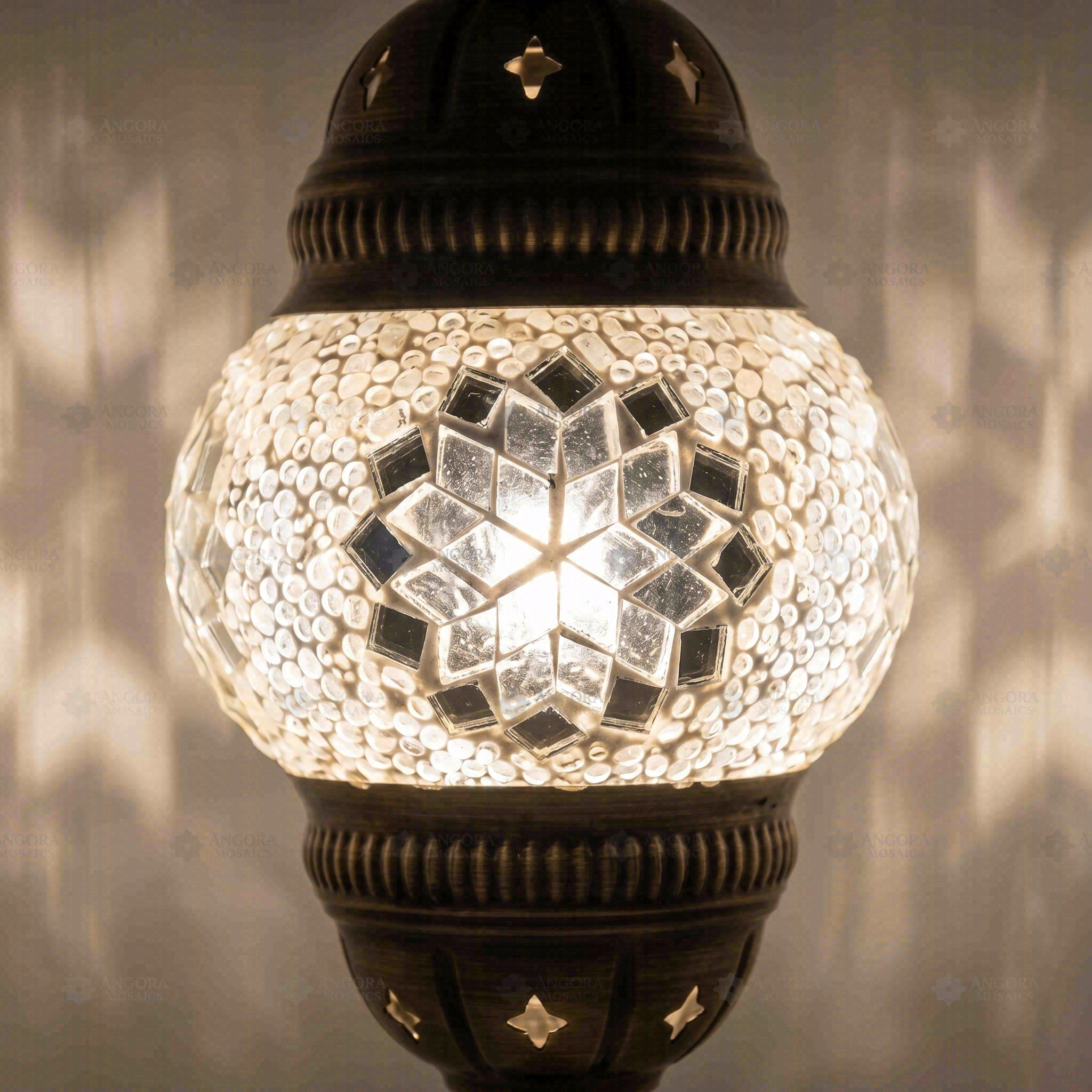 Lit close-up of mosaic glass globe — White pendant light glowing (ENV DYN1001)