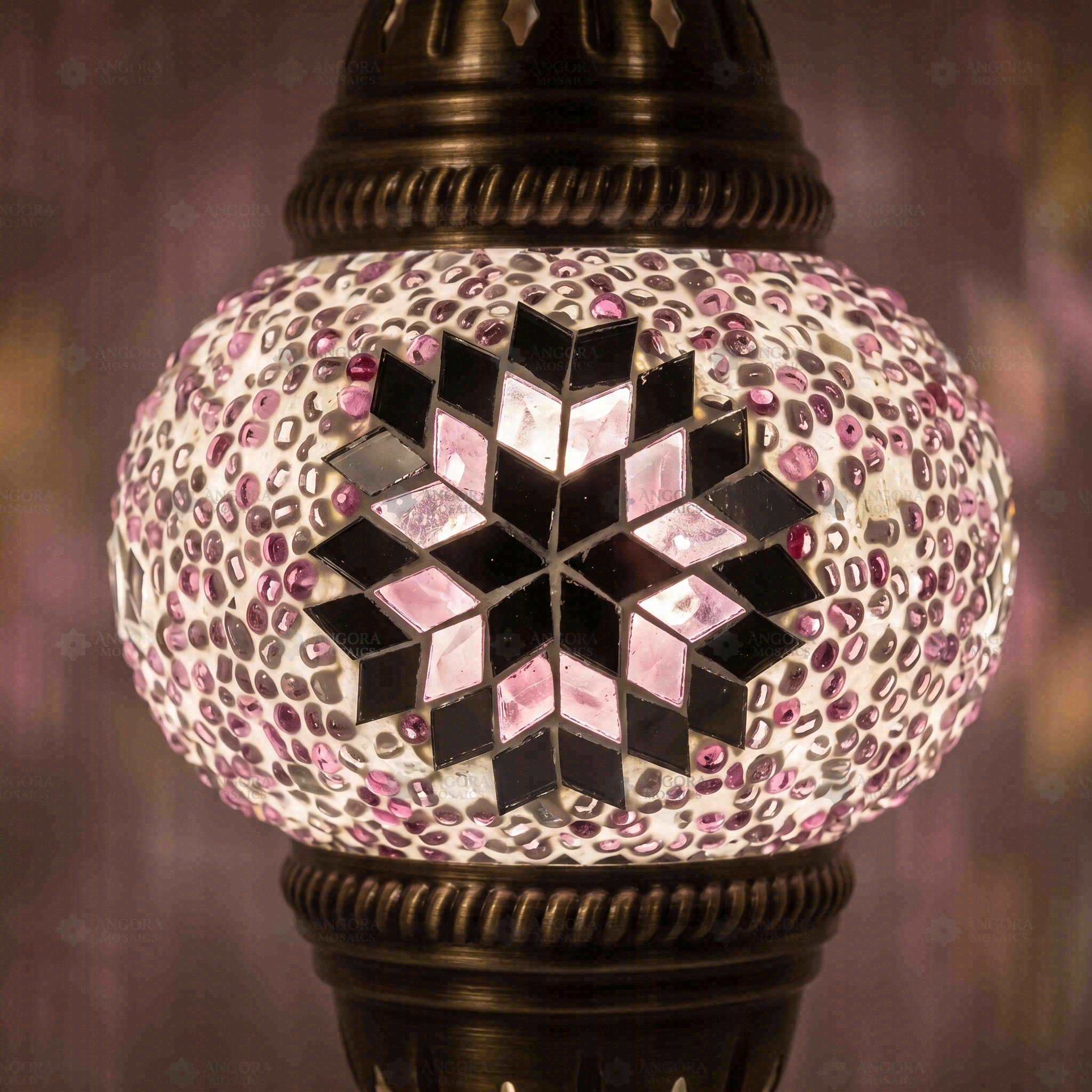 Lit close-up of mosaic glass globe — Pink pendant light glowing (ENV DYN1034)
