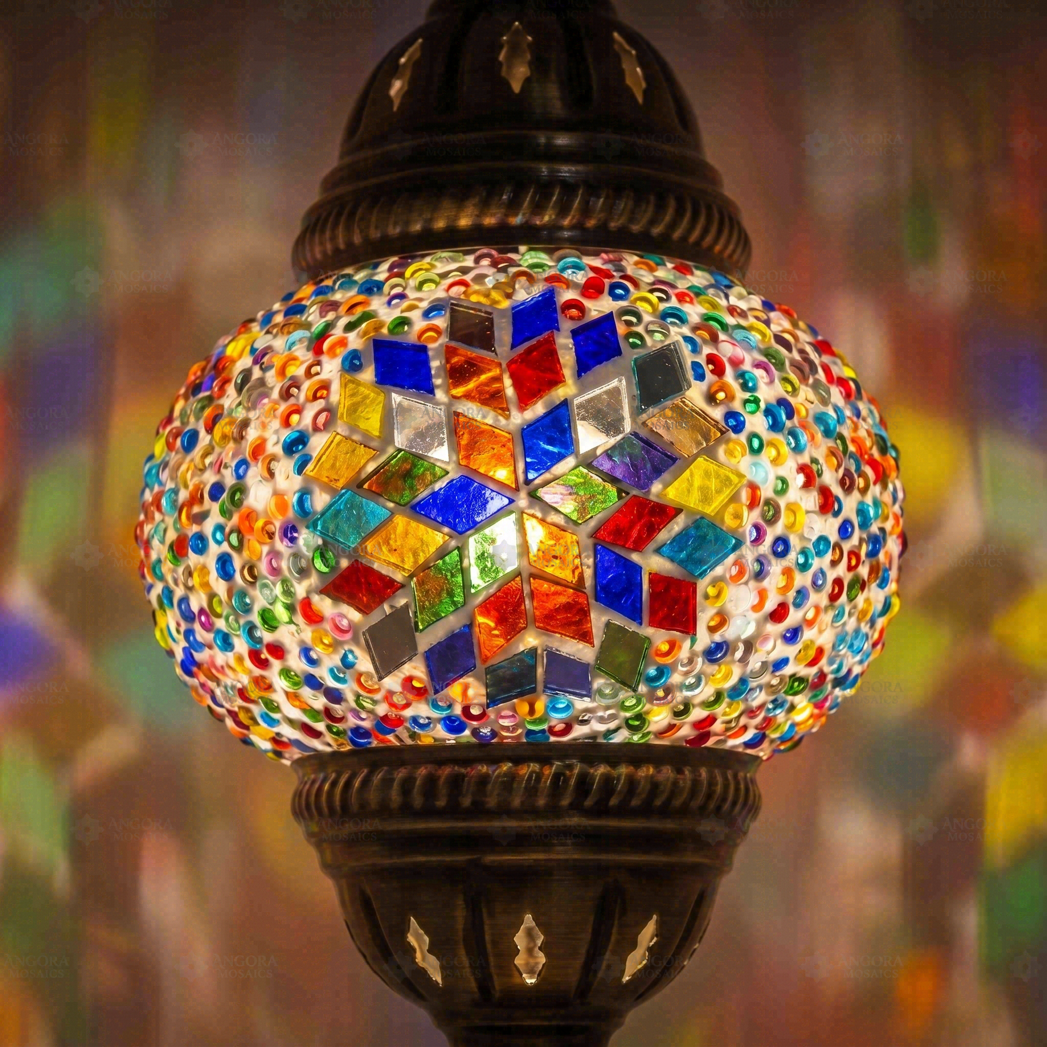 Lit close-up of mosaic glass globe — Multicolor pendant light glowing (ENV DYN1061)