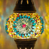 Lit close-up of mosaic glass globe — Cool Tones pendant light glowing (ENV DYN2010)