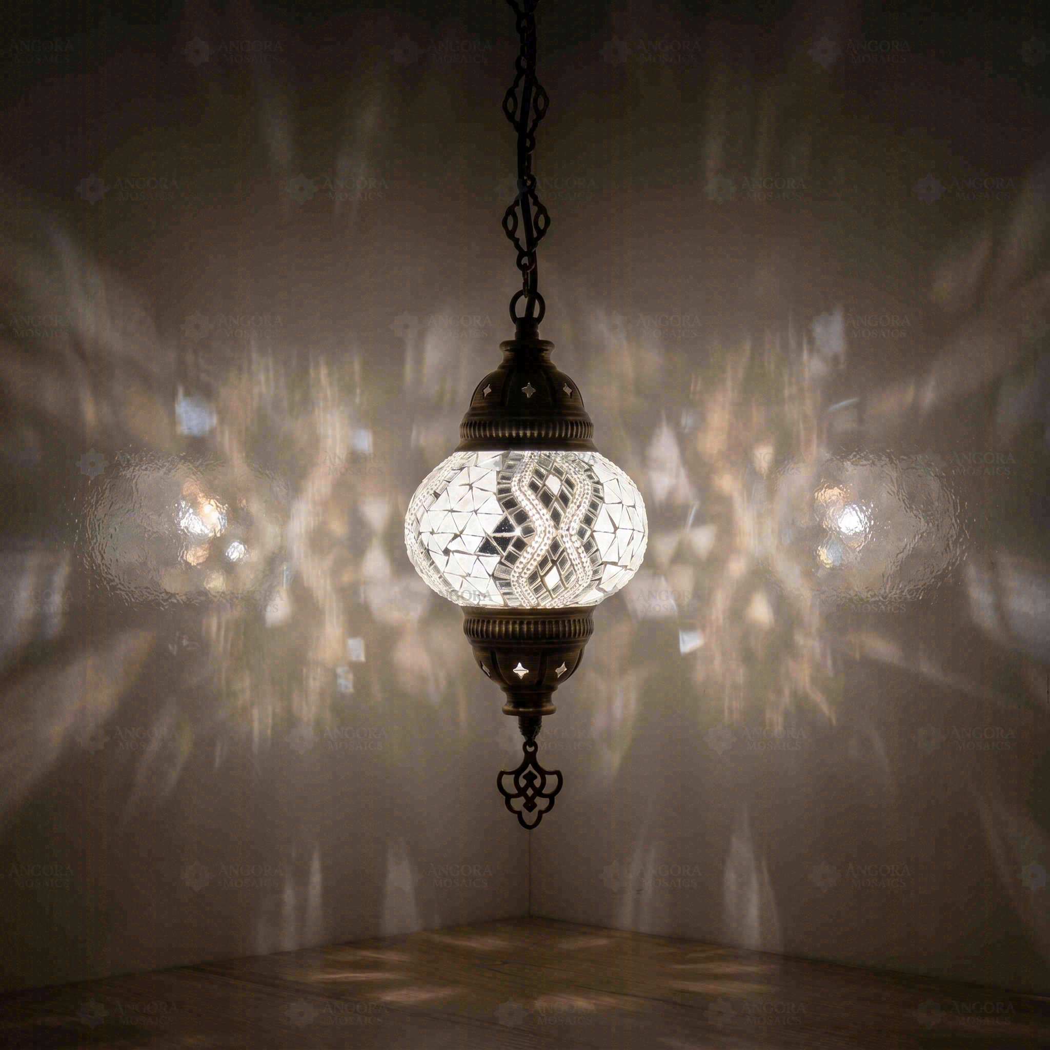 White Turkish mosaic pendant light illuminated, showing colorful light projection (ENV DYN2017)