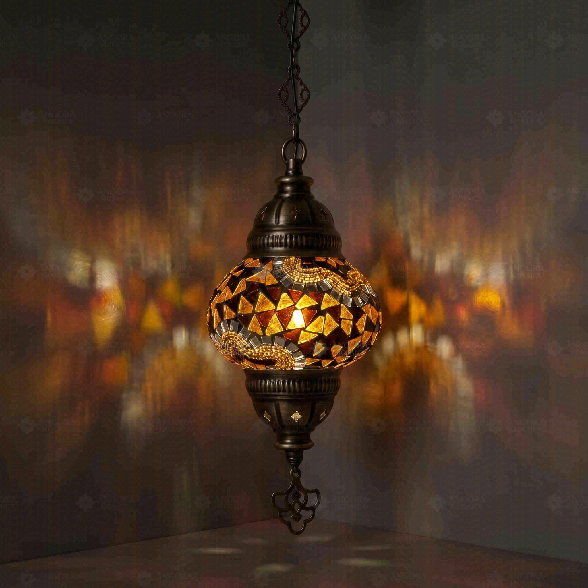 Amber Turkish mosaic pendant light illuminated, showing colorful light projection (ENV DYN2079)