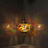 Multicolor Turkish mosaic pendant light illuminated, showing colorful light projection (ENV DYN3002)