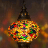 Lit close-up of mosaic glass globe — Multicolor pendant light glowing (ENV DYN3002)