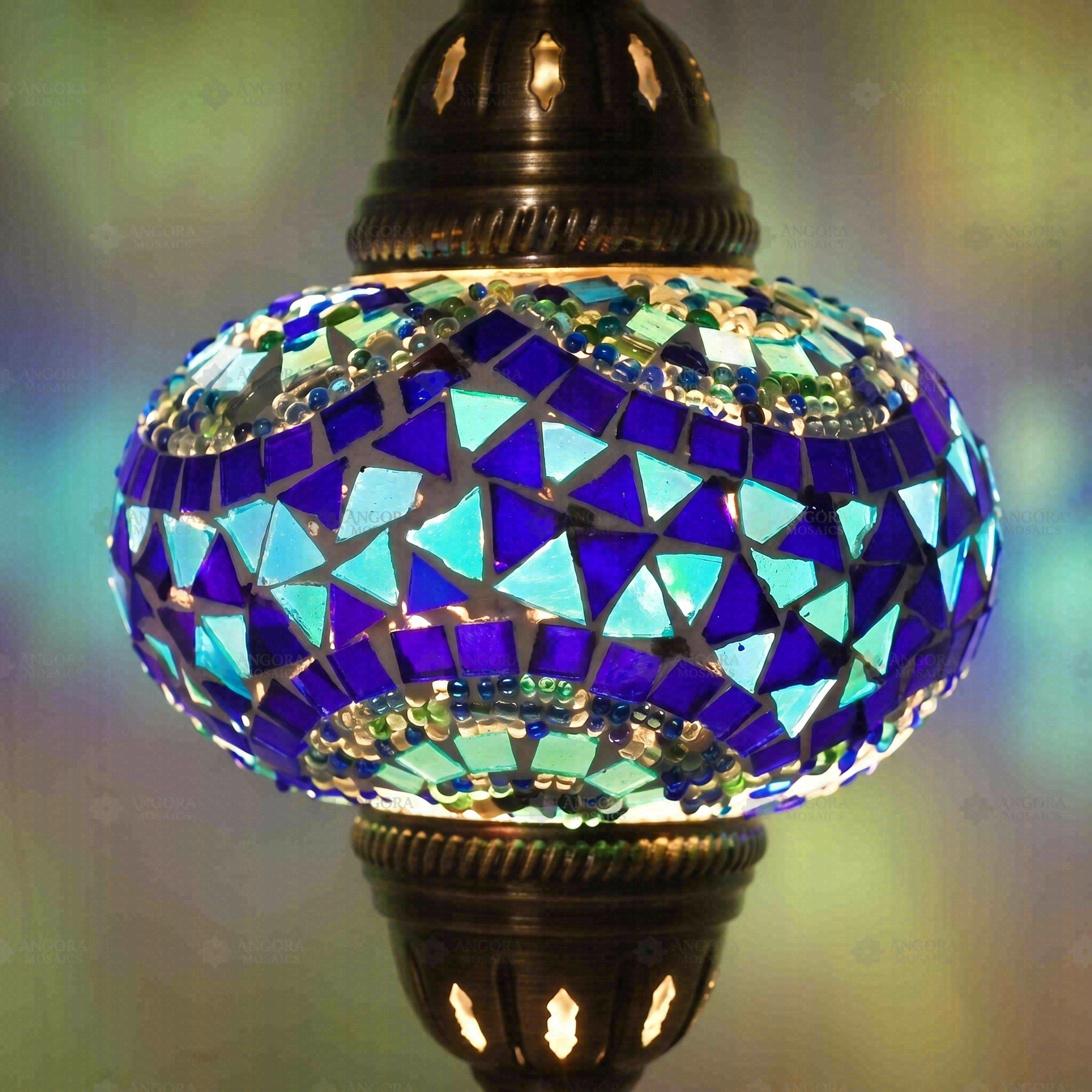 Lit close-up of mosaic glass globe — Blue pendant light glowing (ENV DYN3005)