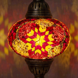 Lit close-up of mosaic glass globe — Red pendant light glowing (ENV DYN3008)