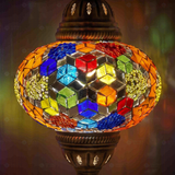 Lit close-up of mosaic glass globe — Multicolor pendant light glowing (ENV DYN3012)