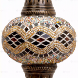 Close-up of Amber warm amber mosaic glass globe pattern — pendant light (ENV DYN3013)