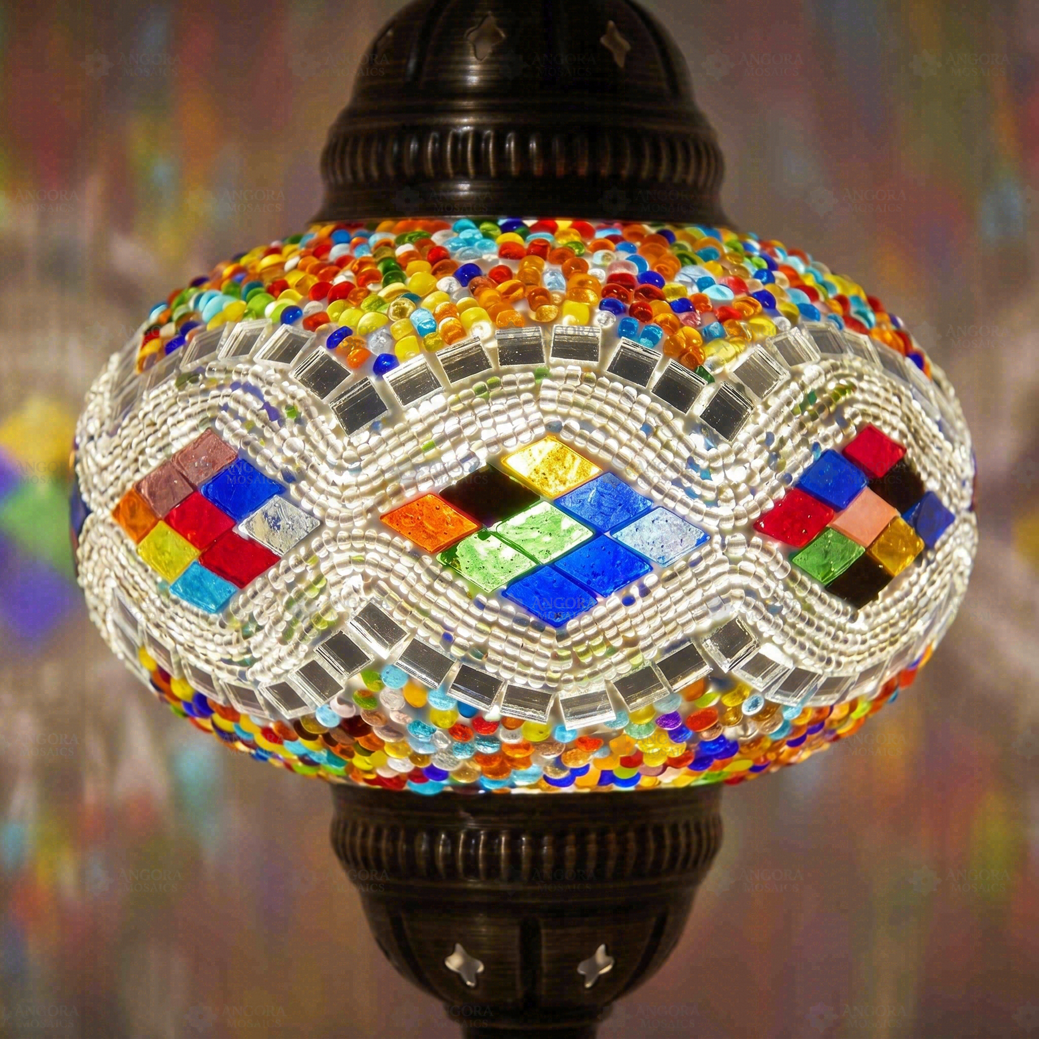 Lit close-up of mosaic glass globe — Multicolor pendant light glowing (ENV DYN3014)