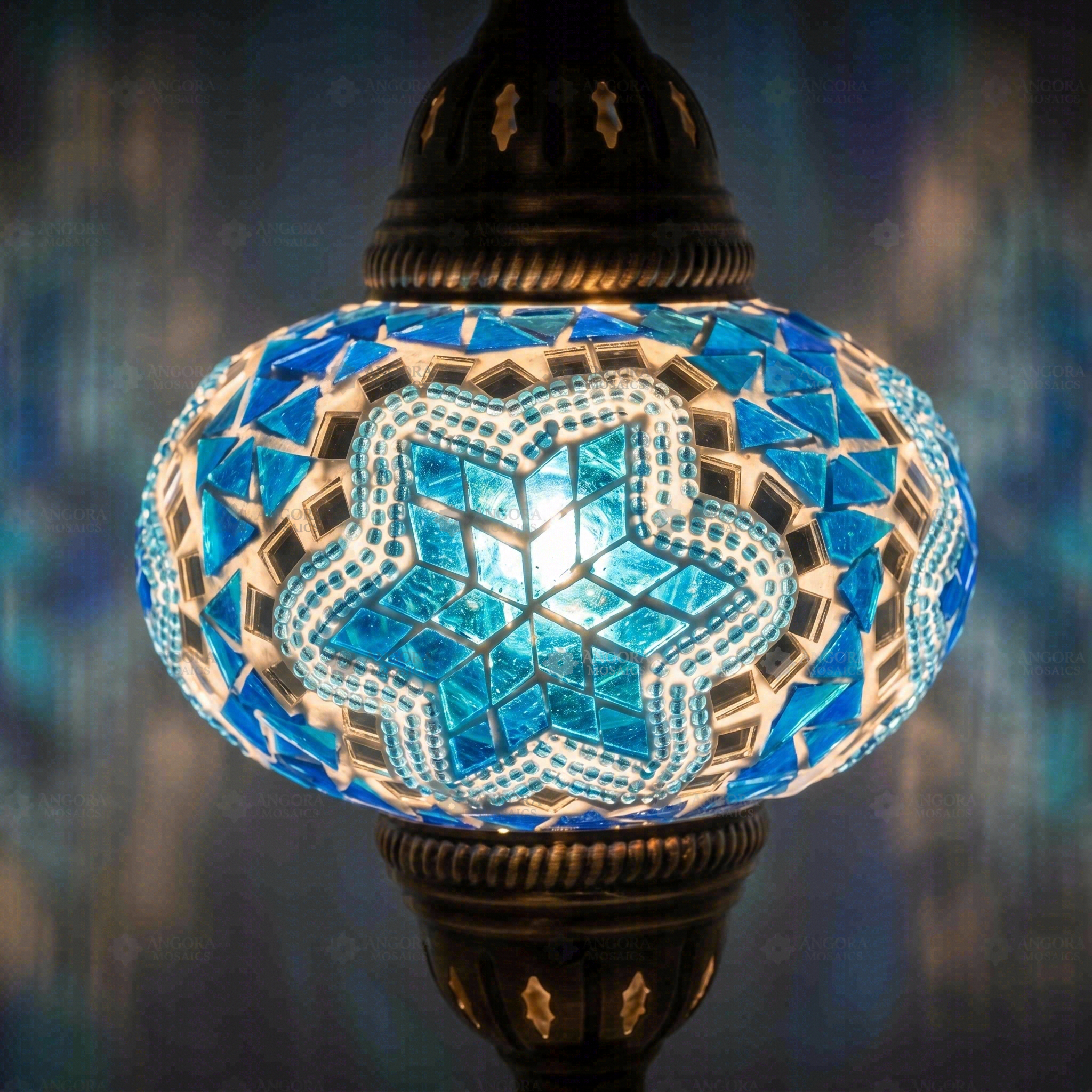 Lit close-up of mosaic glass globe — Blue pendant light glowing (ENV DYN3016)