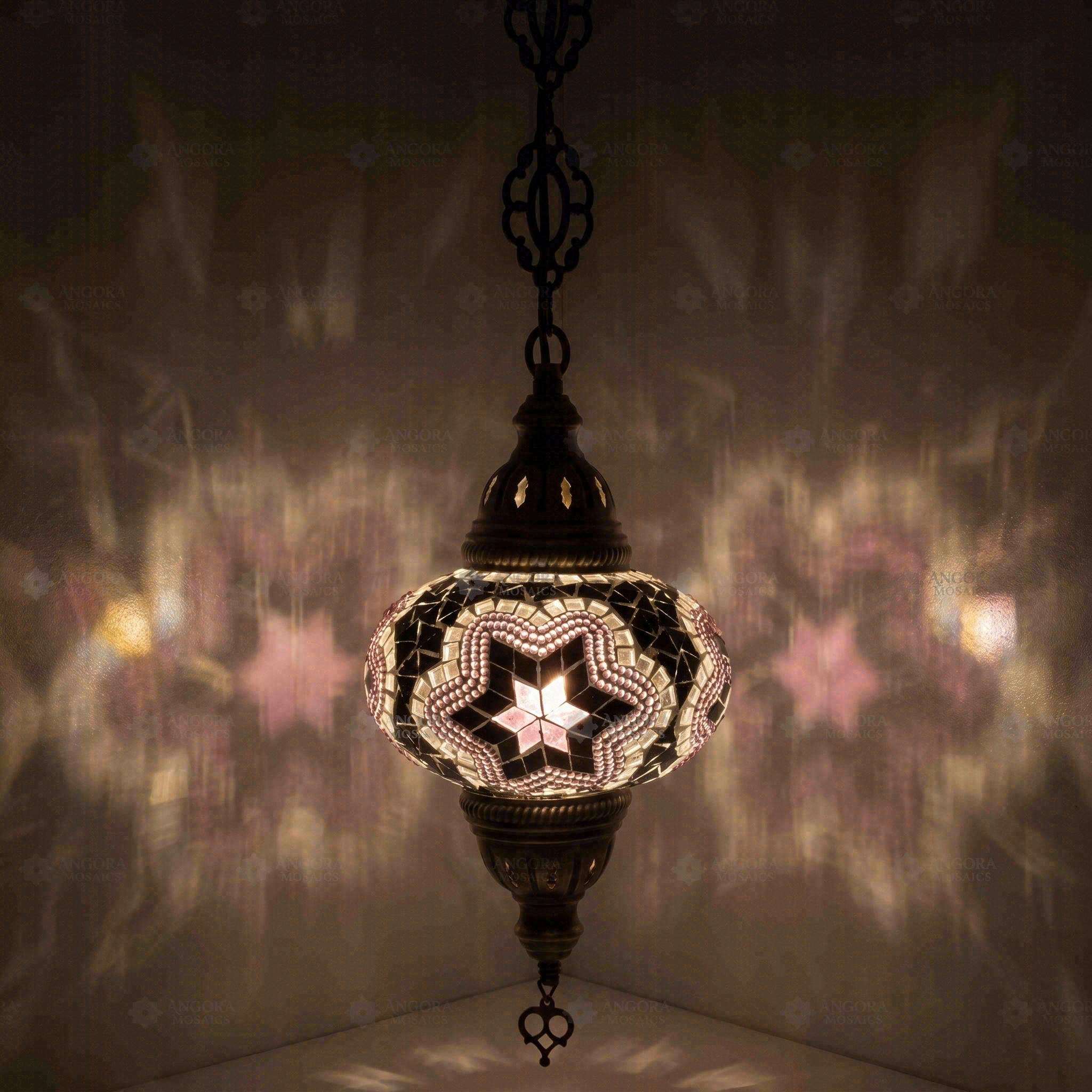 Pink Turkish mosaic pendant light illuminated, showing colorful light projection (ENV DYN3019)