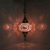 Purple Turkish mosaic pendant light illuminated, showing colorful light projection (ENV DYN3020)