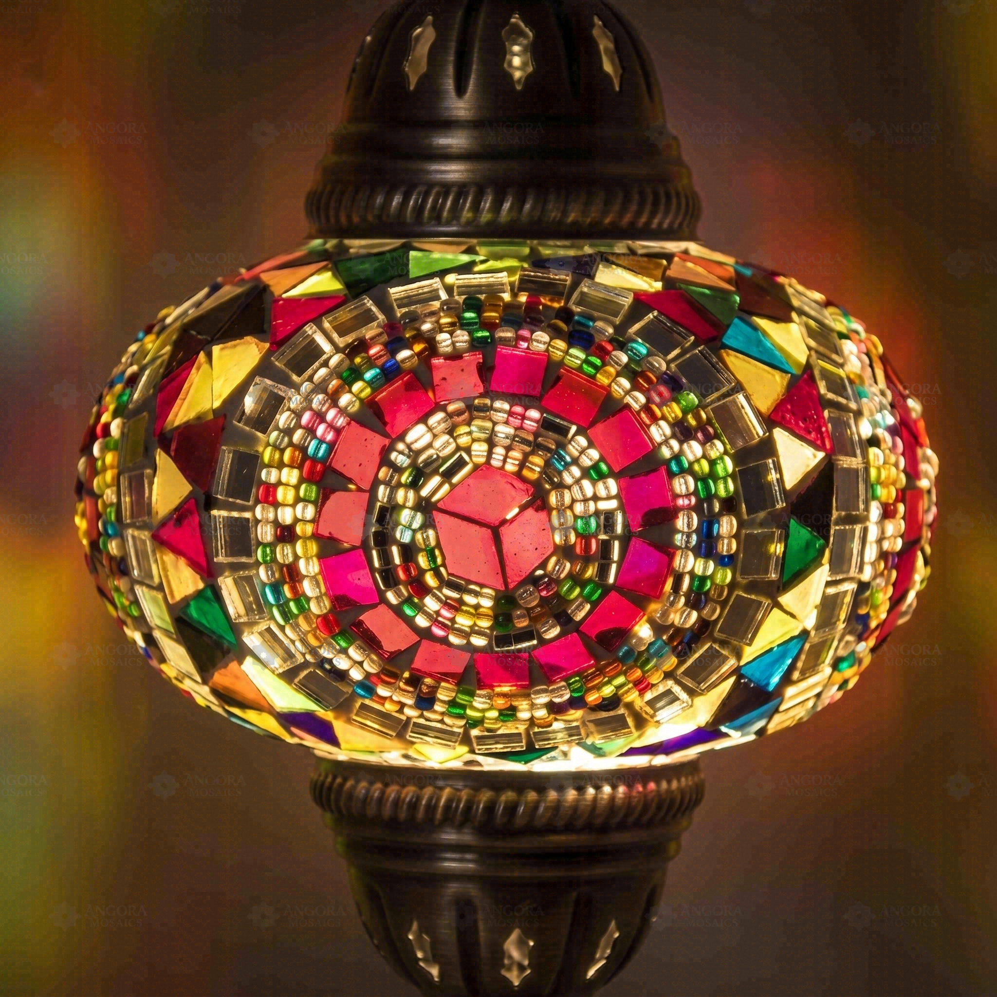 Lit close-up of mosaic glass globe — Multicolor pendant light glowing (ENV DYN3021)