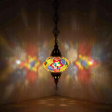 Multicolor Turkish mosaic pendant light illuminated, showing colorful light projection (ENV DYN3024)
