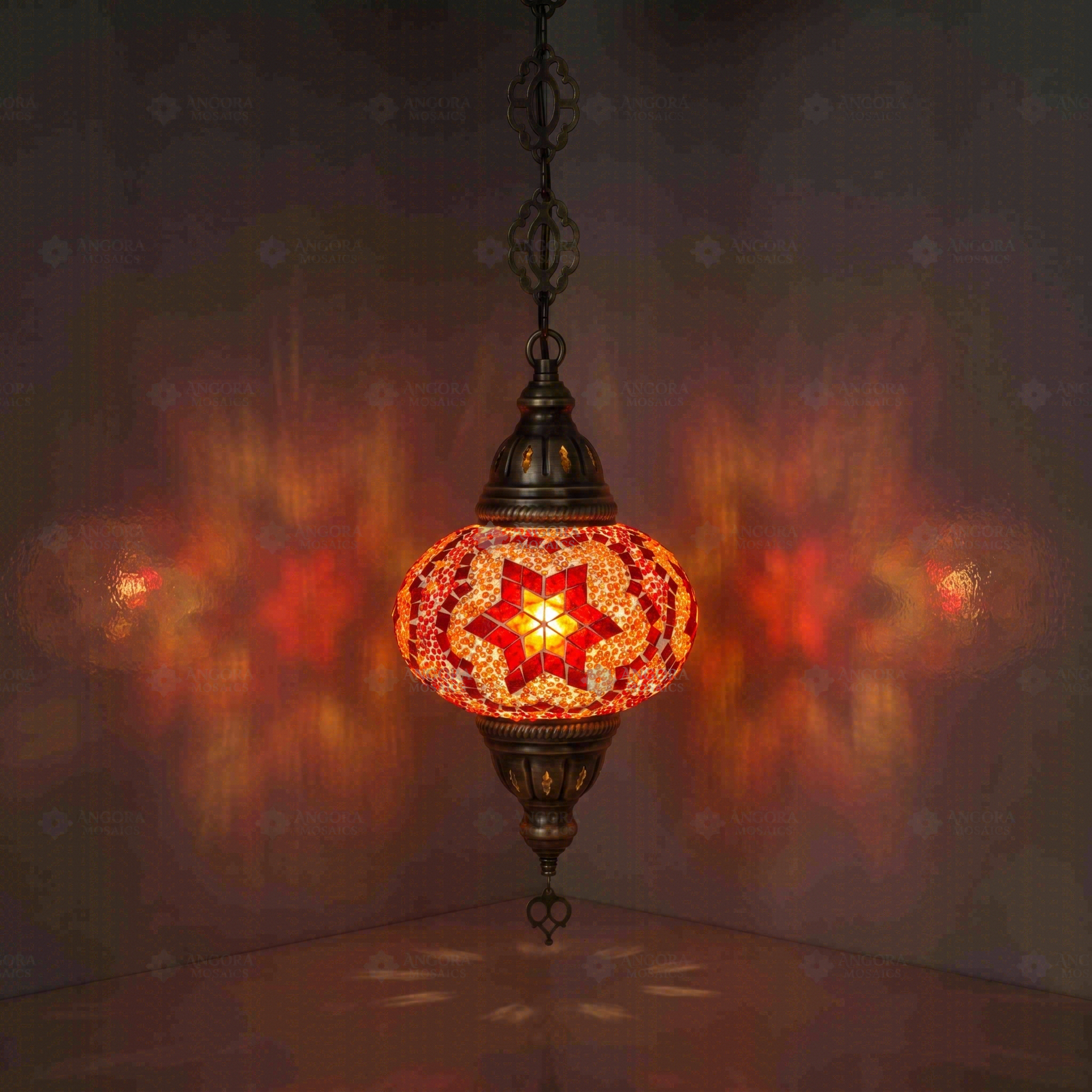 Amber Turkish mosaic pendant light illuminated, showing colorful light projection (ENV DYN3025)
