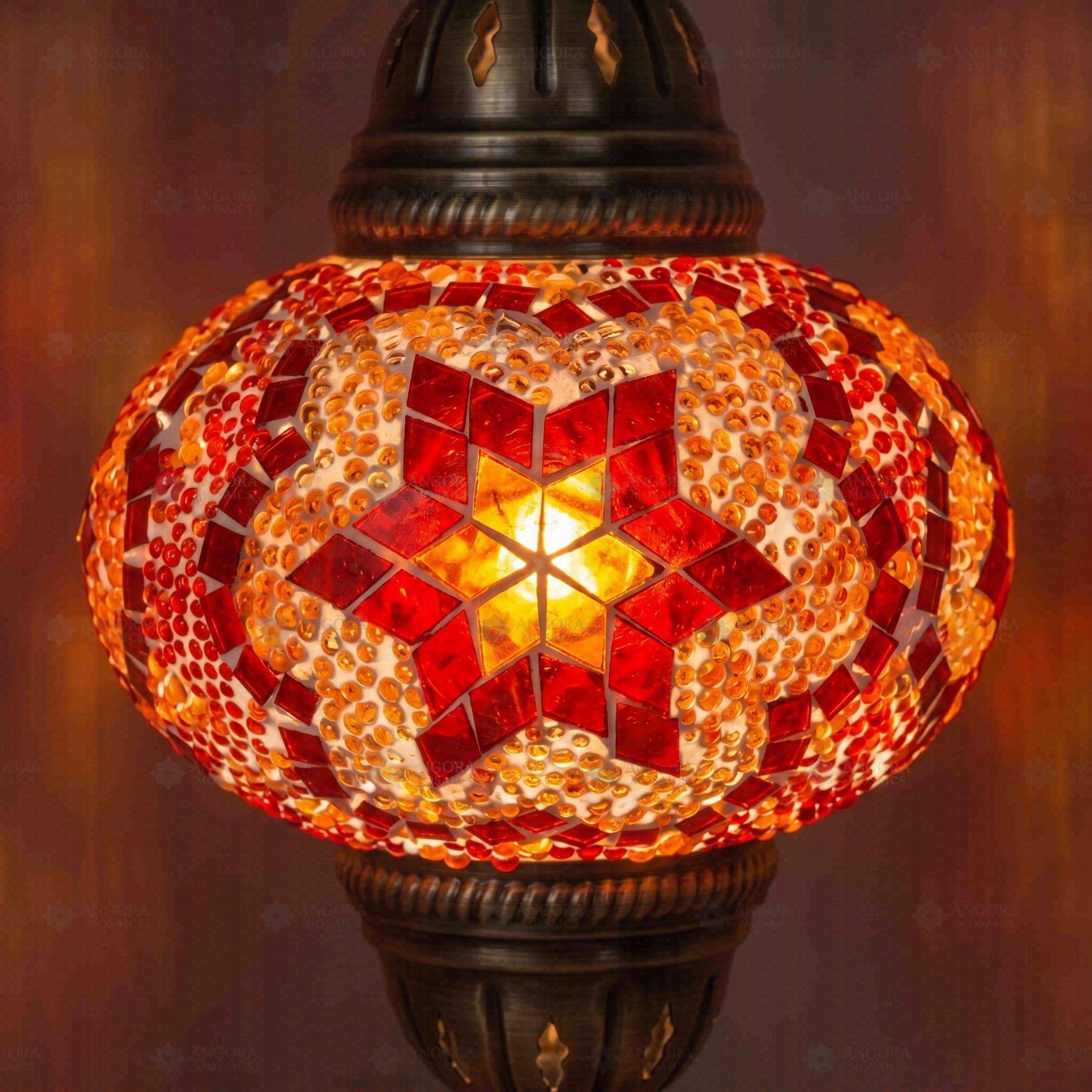 Lit close-up of mosaic glass globe — Amber pendant light glowing (ENV DYN3025)